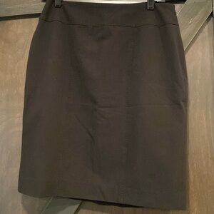 Black skirt with back slit. Size 4.
